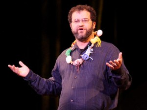 Jonathan Eisen wearing plastic microbes during his Ted Talk!